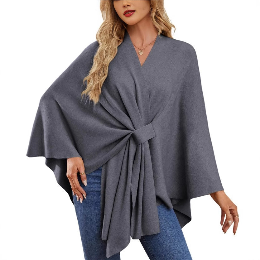 Dame elegant strikkeponcho med raffinerede draperinger og taljebælte Stilla