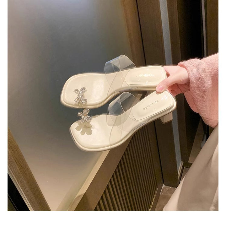 Dame transparente sandaletter med funklende blomsterakcent Stilla