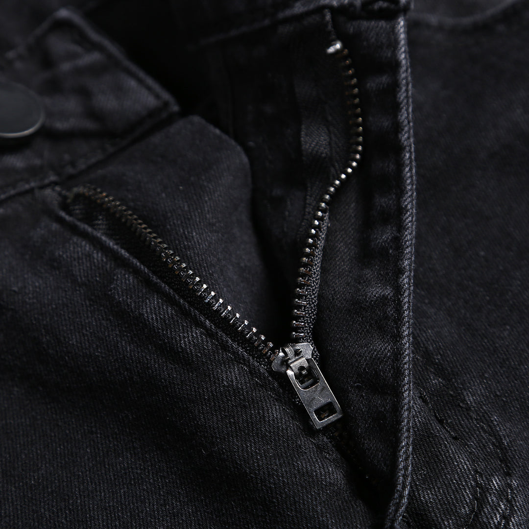 Herrer jeans i used-look med kreative farvesprøjt Stilla