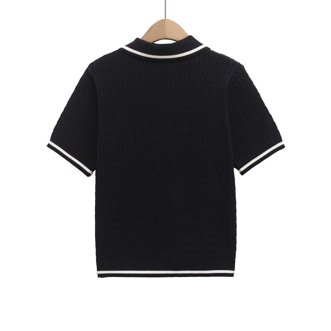 Dame polo shirt med struktureret materiale og fine knapdetaljer Skovae