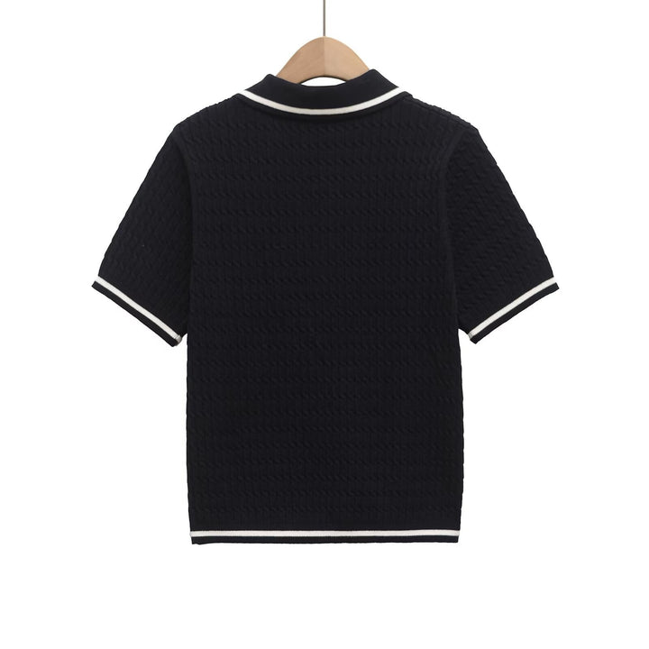 Dame polo shirt med struktureret materiale og fine knapdetaljer Skovae