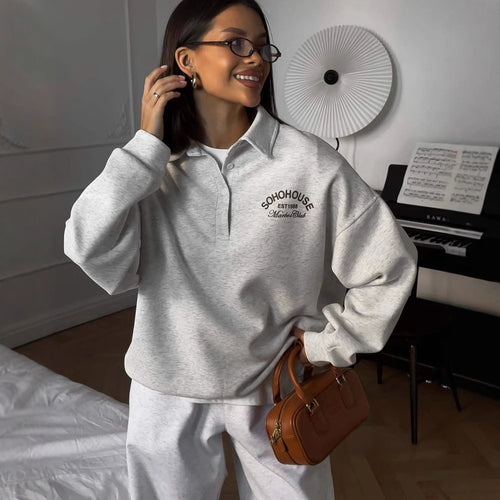 Kvinders afslappede polo sweater med en afslappet pasform og kontrastdetaljer Stilla