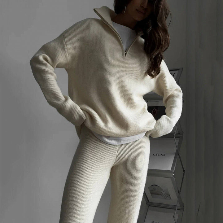 Kvinders komfortable strikket pullover med halv lynlås og ribbet design Skovae