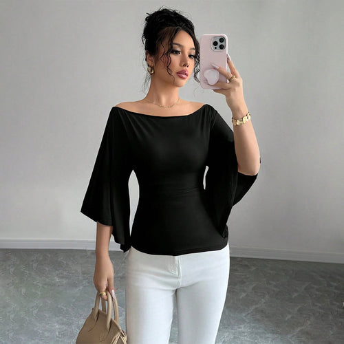 Kvinders elegante off-shoulder top med brede ærmer og figursyet pasform Stilla