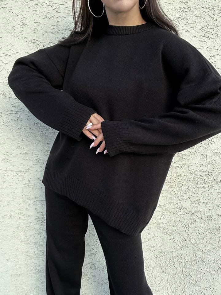 Kvindernes komfortable strikket sweater med høj hals og brede ærmer Skovae