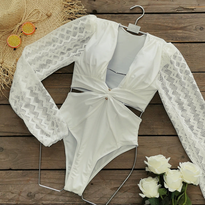 Dame one-piece badedragt med elegante spidse ærmer og raffineret indpakningsdesign Stilla