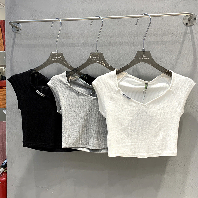 Femme Ripp Crop Top med overdimensioneret V-udskæring Stilla