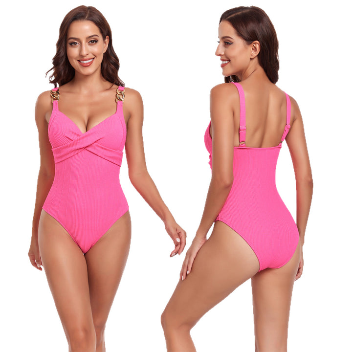 Dame bikini med krydsbåndsdesign og gyldne accenter Skovae