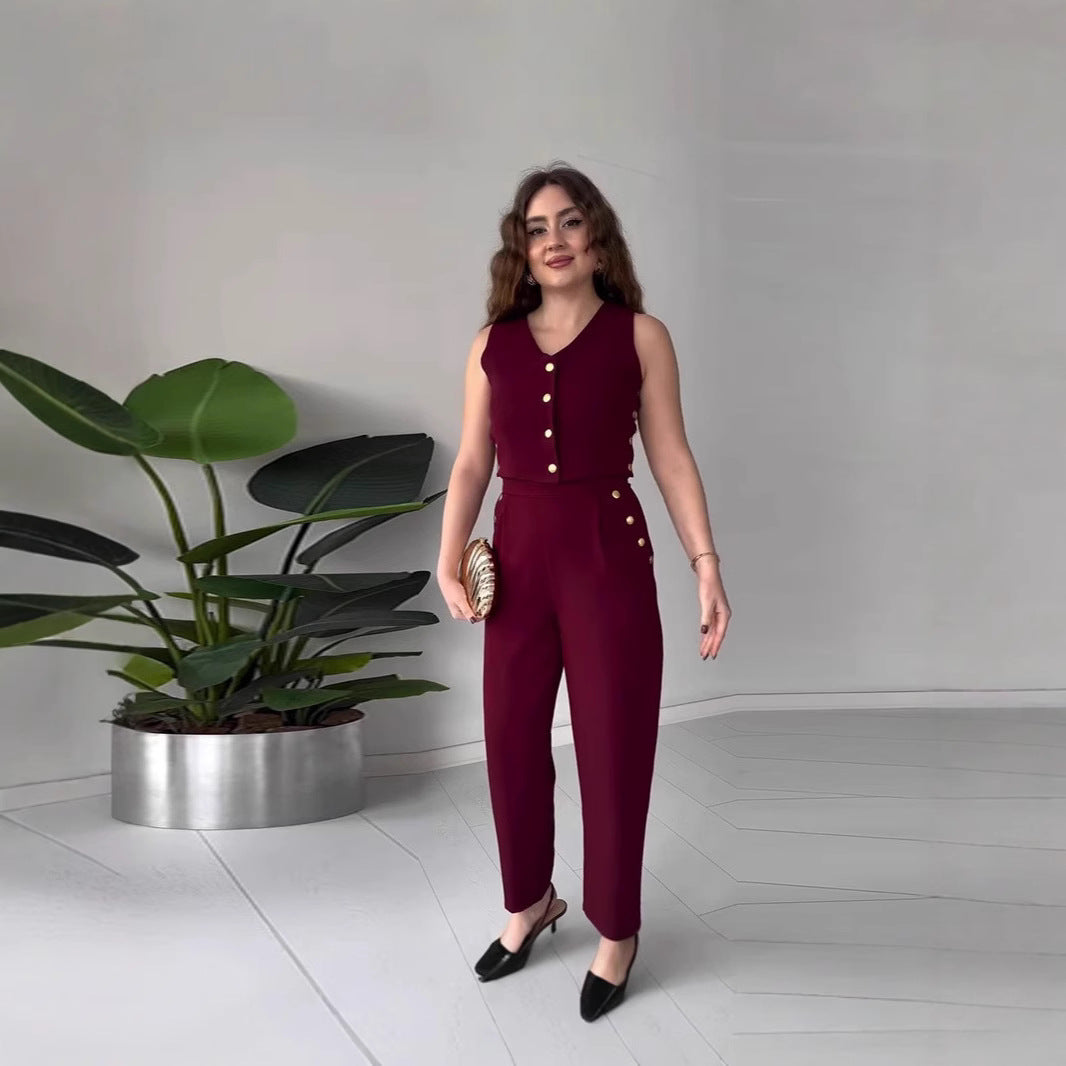 Dame crop-top med elegante knapper og højtaljede bukser Stilla