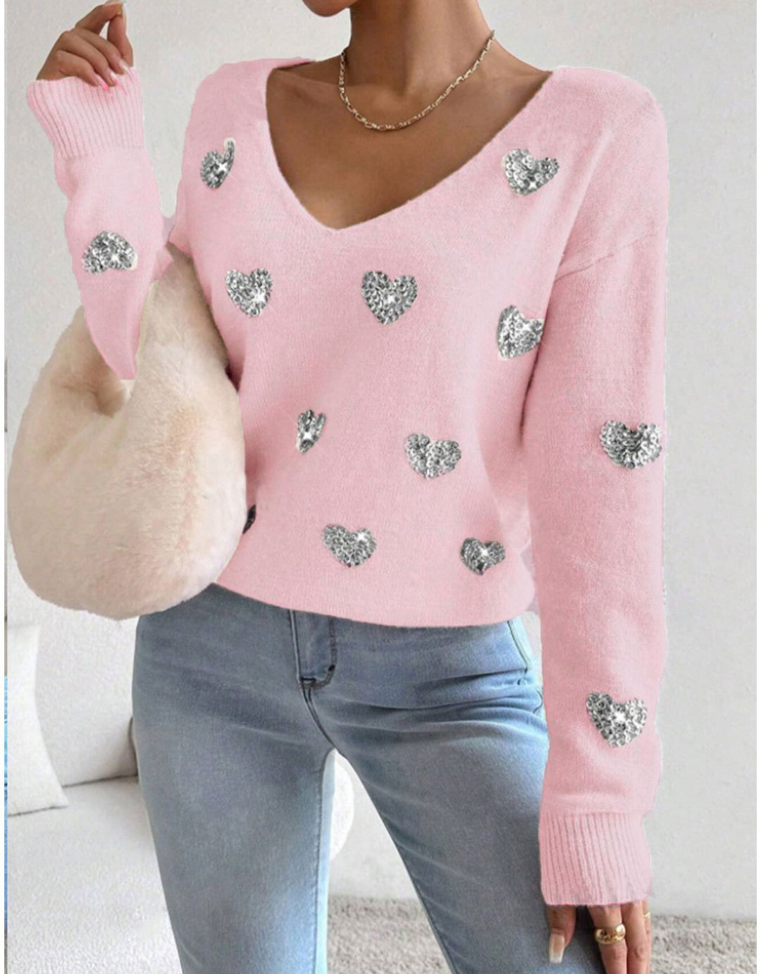Kvindernes oversized sweatervest med dyb V-hals og hjerte motiv Stilla