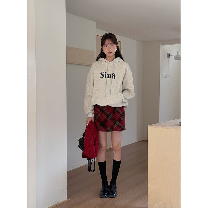 Dame rutet mini skirt i blød uldblanding med elegante lommer og plisseringer Stilla