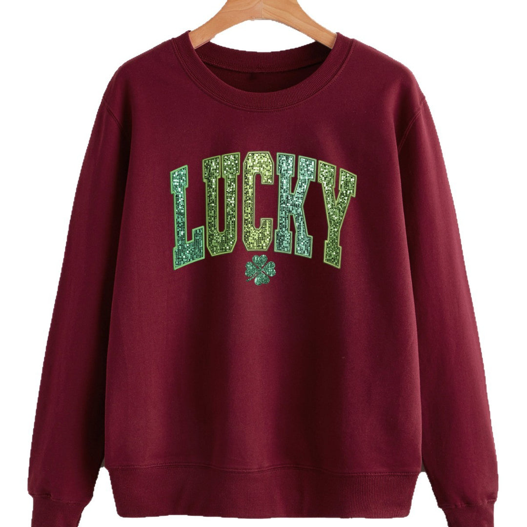 Dame casual sweatshirt med glitrende skrift og kløver motiv Stilla