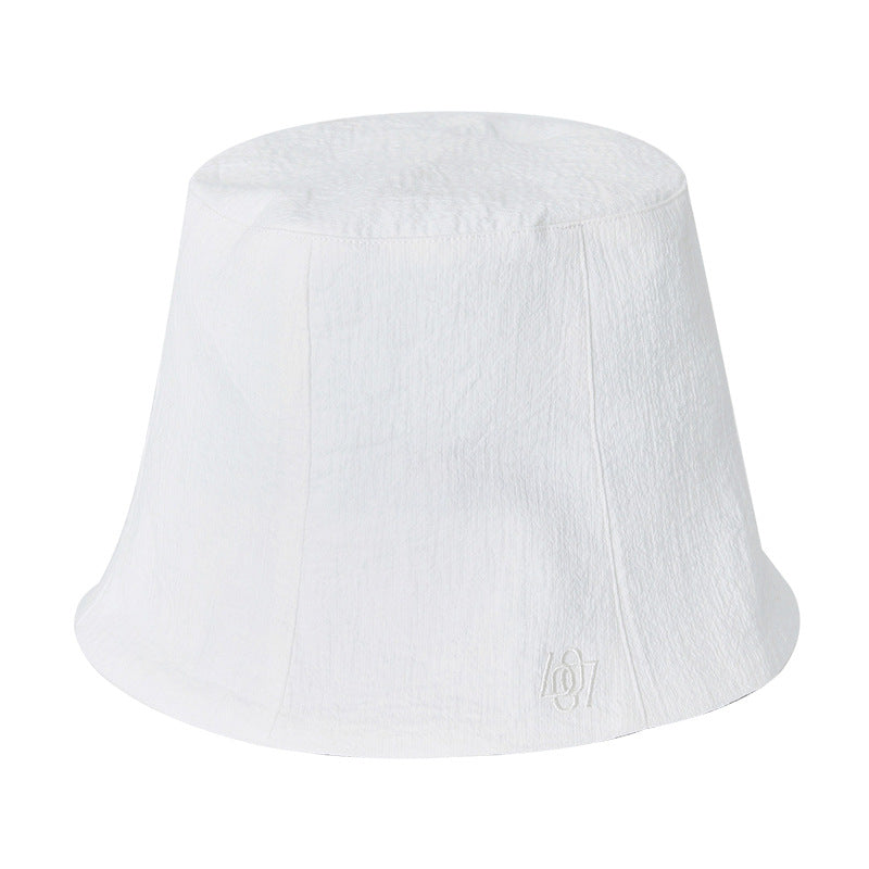 Dame Bucket Hat lavet af let bomuldsblandingsmateriale med afslappet design Stilla