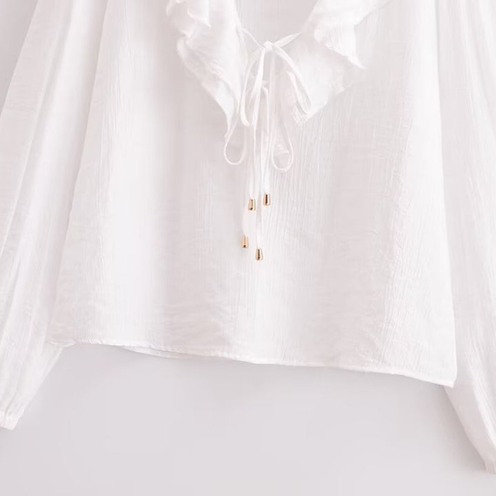 Damebluse med volangkrave og rynker Stilla