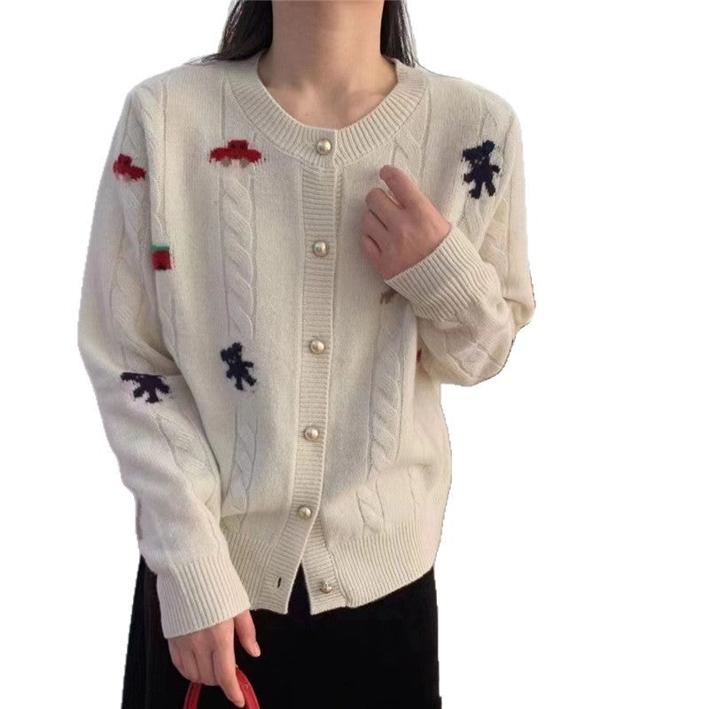 Kvinders cardigan med farverigt motiv og dekorative knapper Stilla
