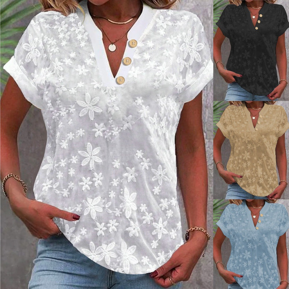 Damebluse med feminint blomsterbroderi-mønster Stilla