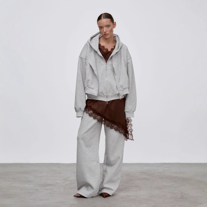 Damernes oversized hoodiejakke med generøse lommer og stilfuldt design Stilla