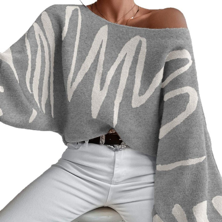 Kvinders oversized striktrøje med asymmetrisk design og afslappet halsudskæring Stilla