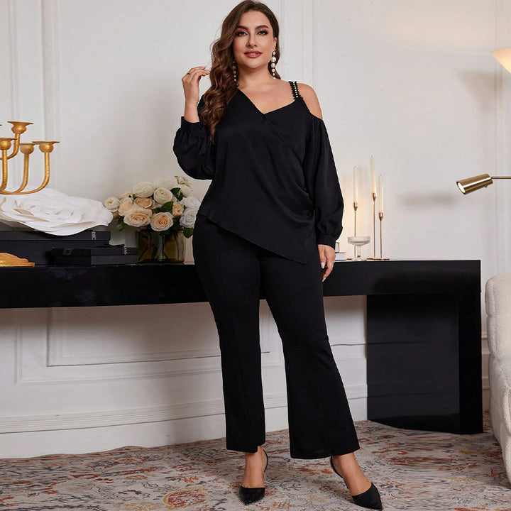 Dame asymmetrisk bluse med legende cut-out og dekorative stropdetaljer Stilla