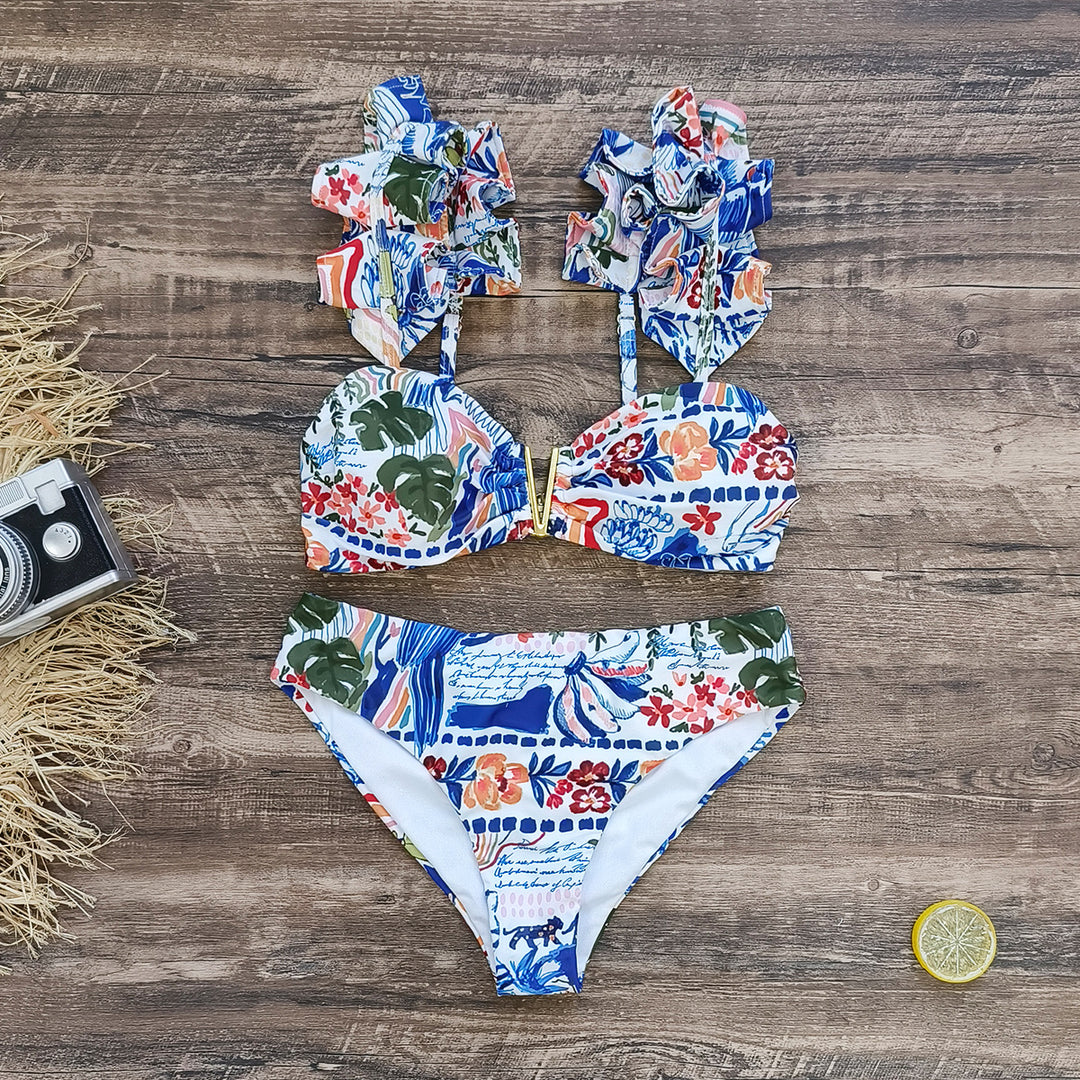 Dame bikini-sæt med voluminøse flæsedetaljer og elegant blomster-design Stilla