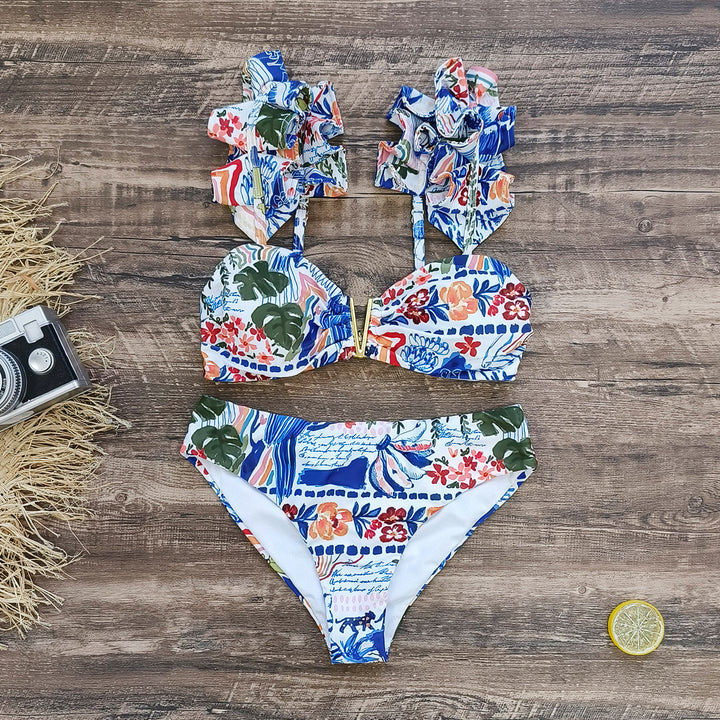 Dame bikini-sæt med voluminøse flæsedetaljer og elegant blomster-design Stilla