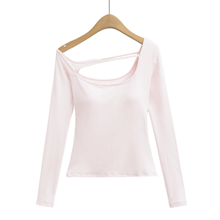 Dame langærmet top med innovativt cut-out-design og figursyet pasform Stilla