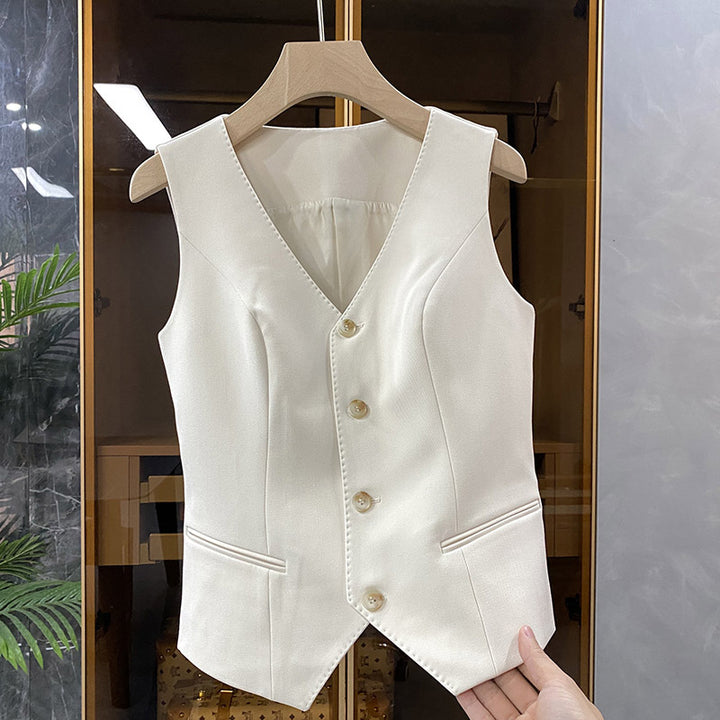 Dame elegant vest med fine guldknapdetaljer Stilla