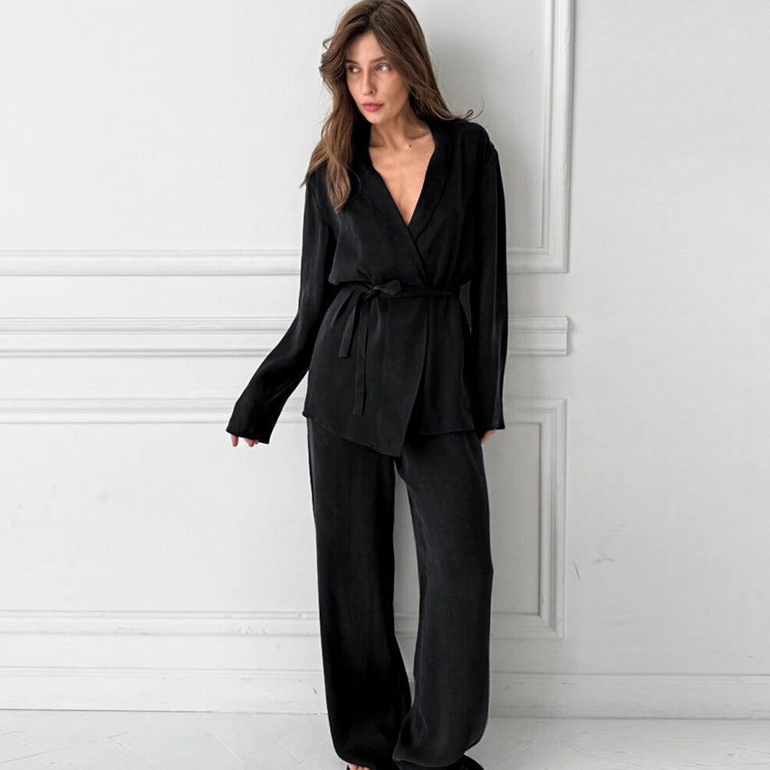 Damer elegant blazer- og bukseensemble med svingende snit og praktiske lommer Stilla