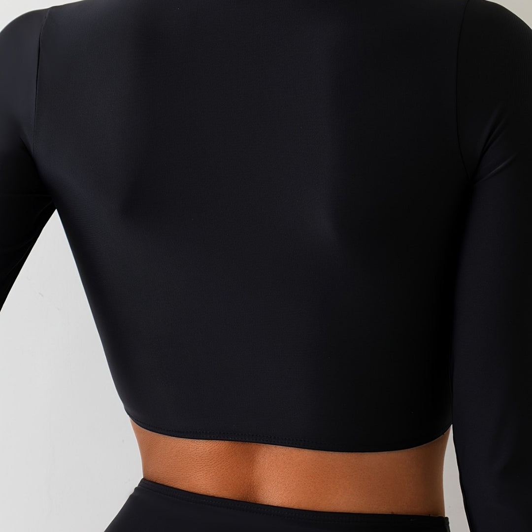 Dame sporty crop-top med lange ærmer og høj krave Stilla