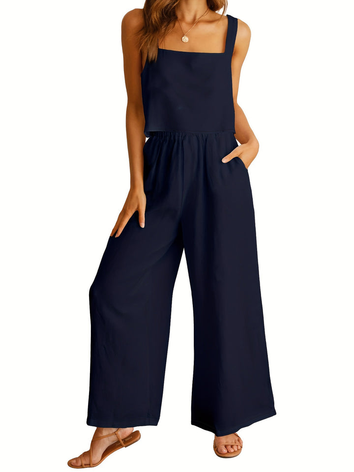 Dame jumpsuit med brede ben og praktiske lommer Stilla