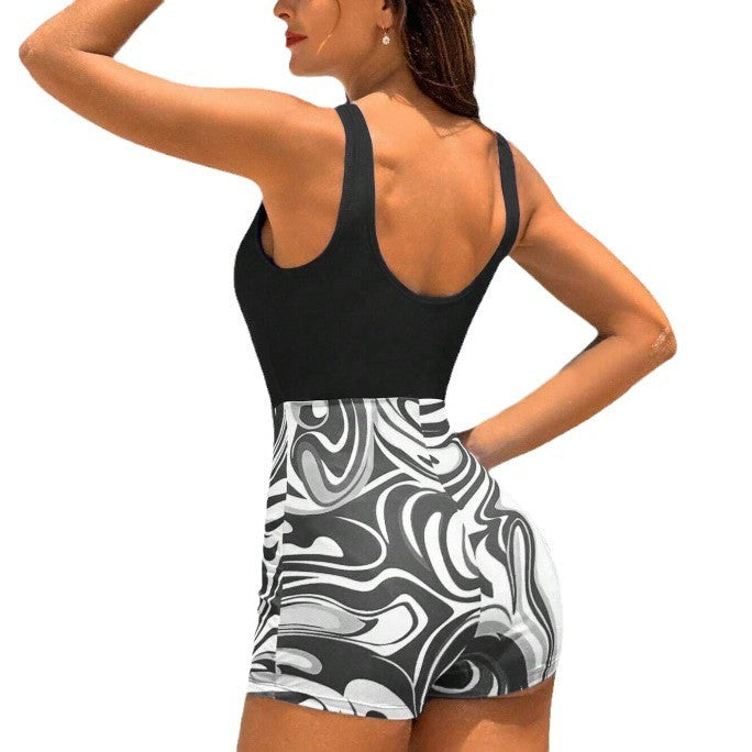 Dame Sporty Én-Del Badedragt med grafisk Swirl-Design Stilla
