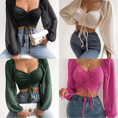 Dame Crop-Top med struktureret krop og elegante pufærmer Skovae