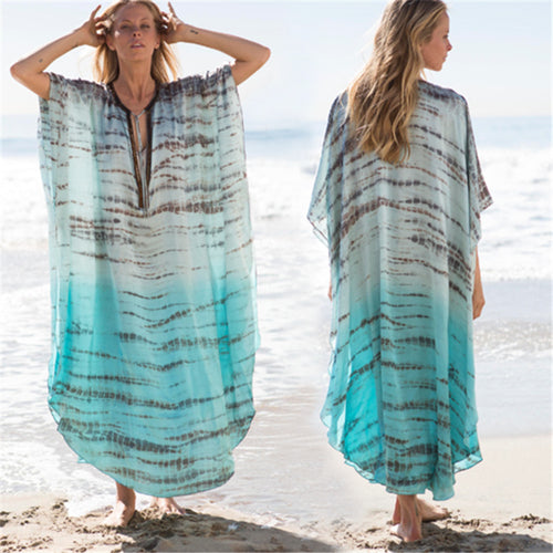 Dame luftig Strandkaftan med elegant bølgemønster og sidelukning Stilla