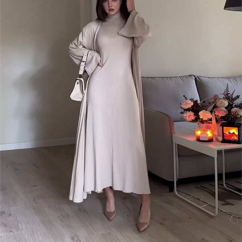 Dame elegant maxikjole med høj krave og bredt skårne ærmer Stilla