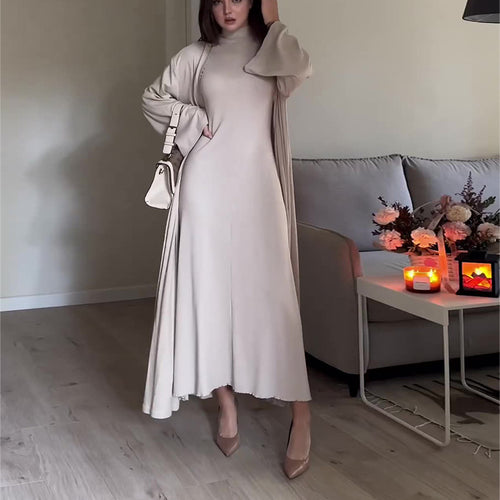 Dame elegant maxikjole med høj krave og bredt skårne ærmer Stilla