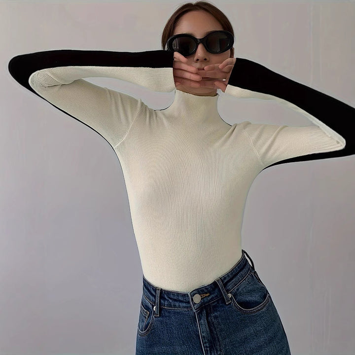 Dame langærmet top i elegant ribdesign med ståkrave Stilla