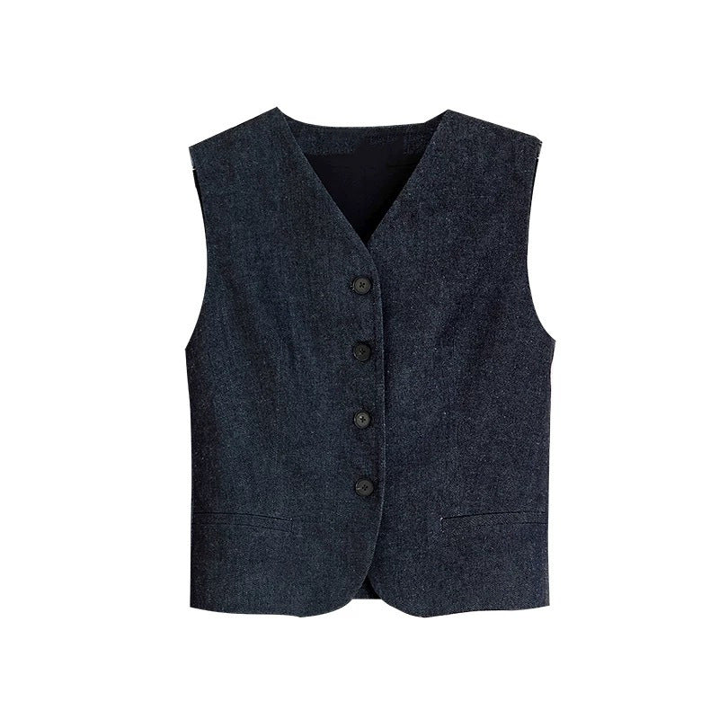 Dame mode vest med knappræget design og struktureret materiale Stilla