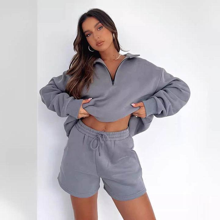 Damer sporty fritidssæt med kort top og elastisk talje