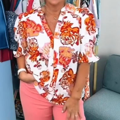 Damebluse med blomsterdesign og voluminøse ærmer Stilla
