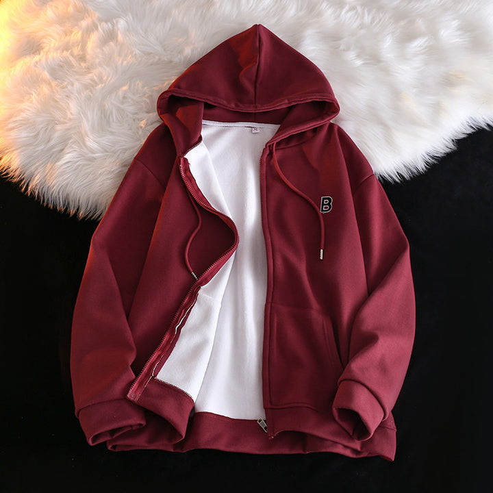 Femme Cozy Zip-Up Hoodie med elegant broderet detalje Stilla