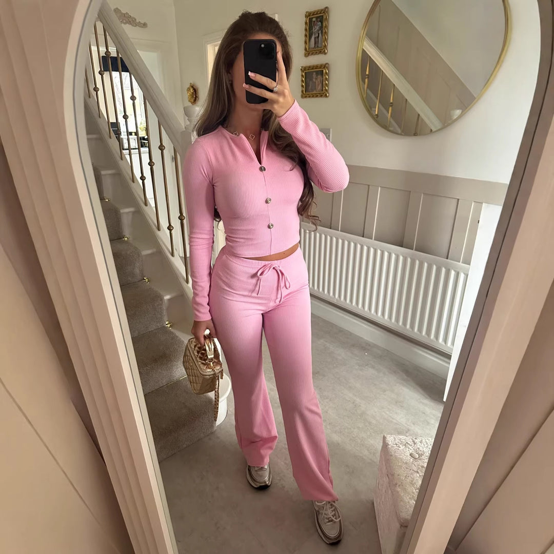 Dame jumpsuit med elegant knaplukning og afslappet snit