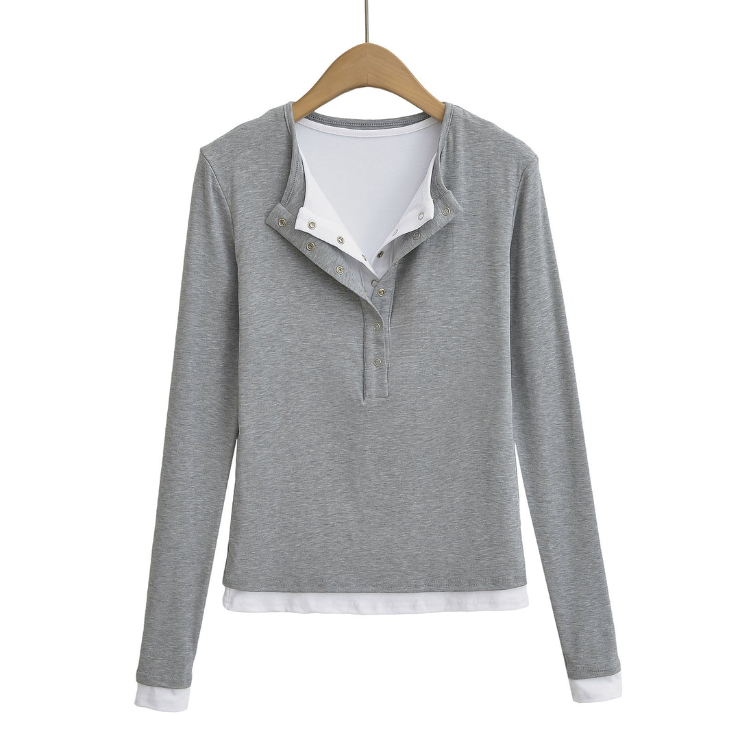 Dame langærmet Henley-shirt med fashionable knapdetaljer og elegant snit Stilla