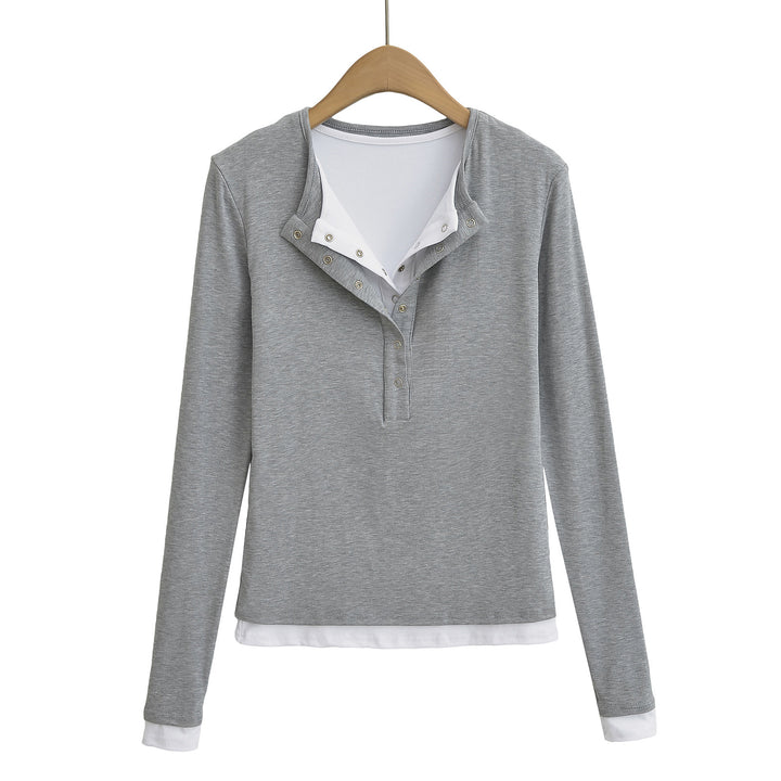 Dame langærmet Henley-shirt med fashionable knapdetaljer og elegant snit Stilla