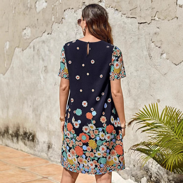 Dame fritidskjole med floralt design og tiltalende snit Stilla