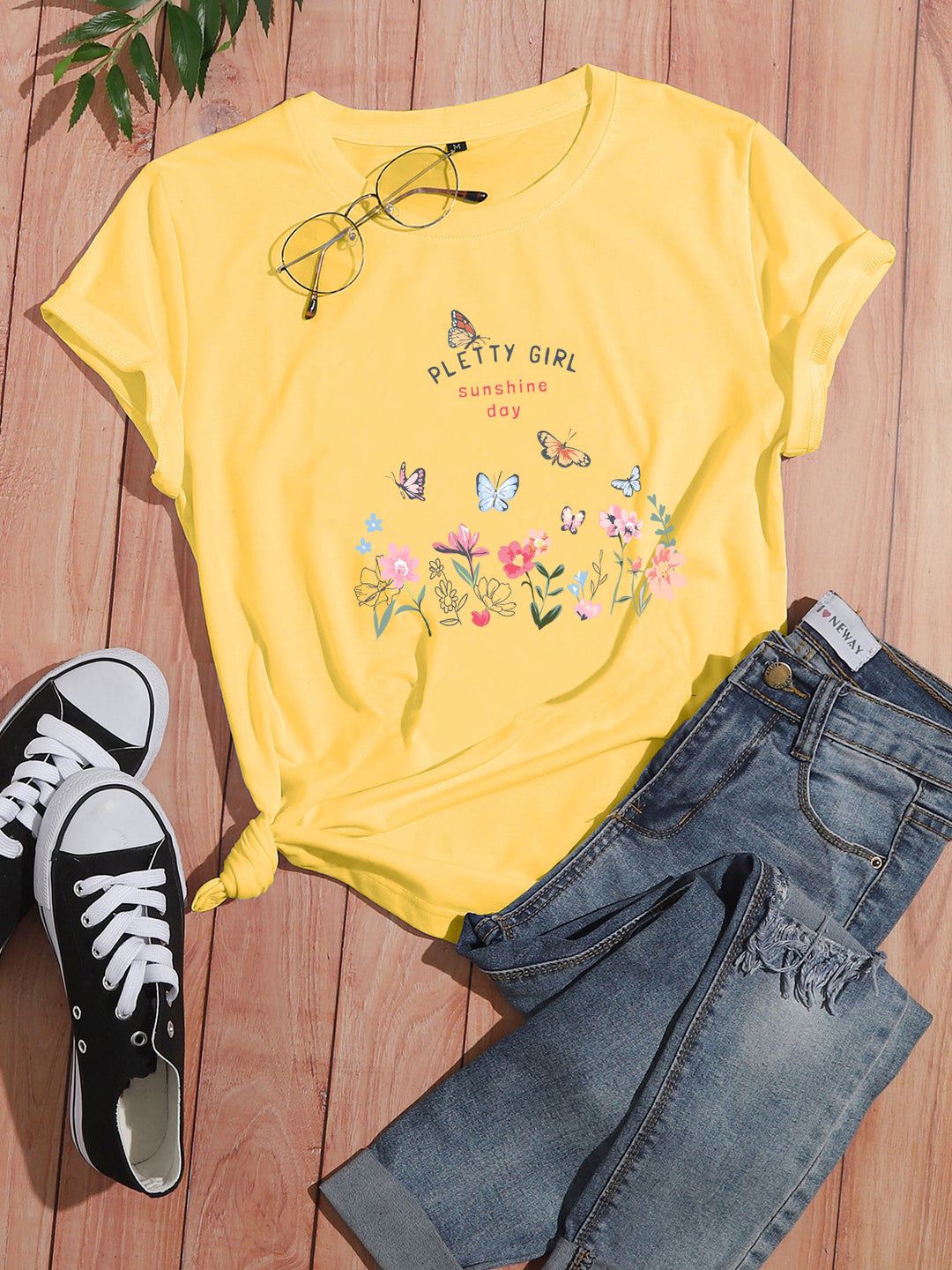 Kvinders t-shirt med legende blomsterprint og elegant print Stilla