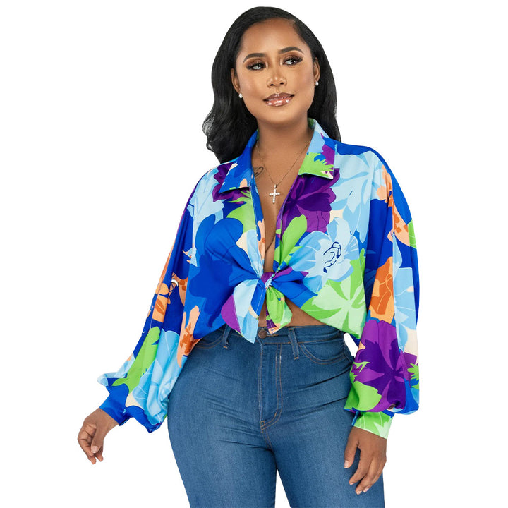 Dame Trendy blomsterbluse i oversized stil med slipselukning Stilla