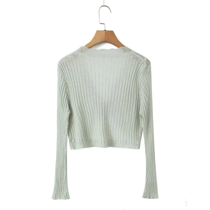 Dame cropped strikjakke med fint ribdesign og sarte spidsdetaljer Stilla