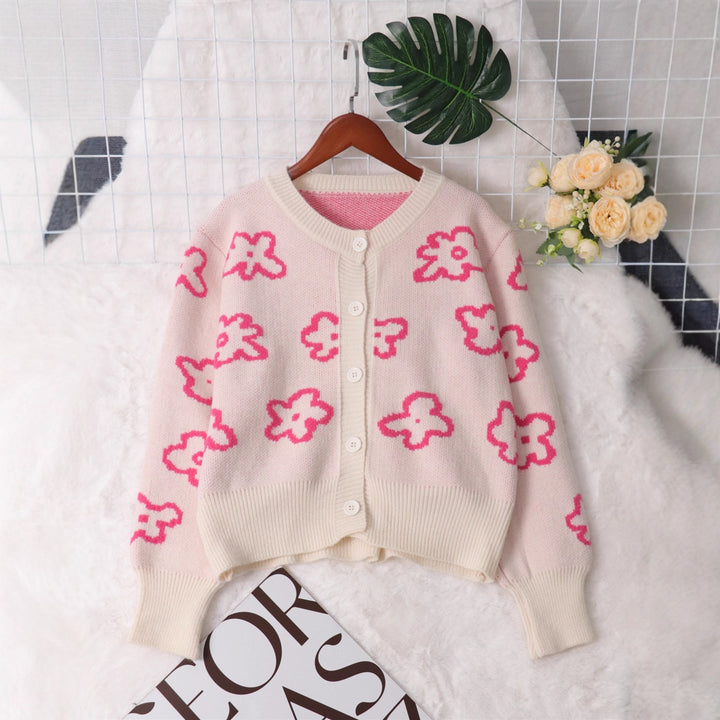 Kvinders cardigan med blomsterdesign og knapdetaljer Stilla