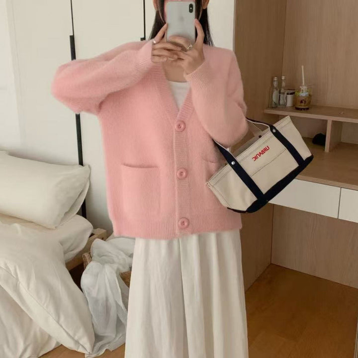 Kvinders fluffy knap cardigan med elegante lommer Stilla