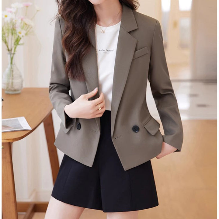 Dame mode blazer med dobbelt knaplukning og elegant snit Stilla